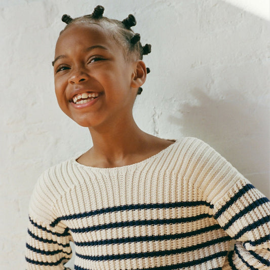 Kids Girls' cotton boatneck sweater in navy stripe - J.Crew